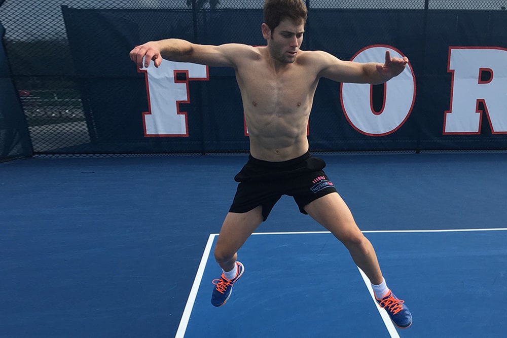 Tennis Player Jumps on the Tennis Court Without T-Shirt.